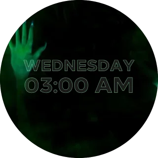 Wednesday NZXT Kraken LCD clock screen with a green-lit hand in the dark and an outlined weekday and time
